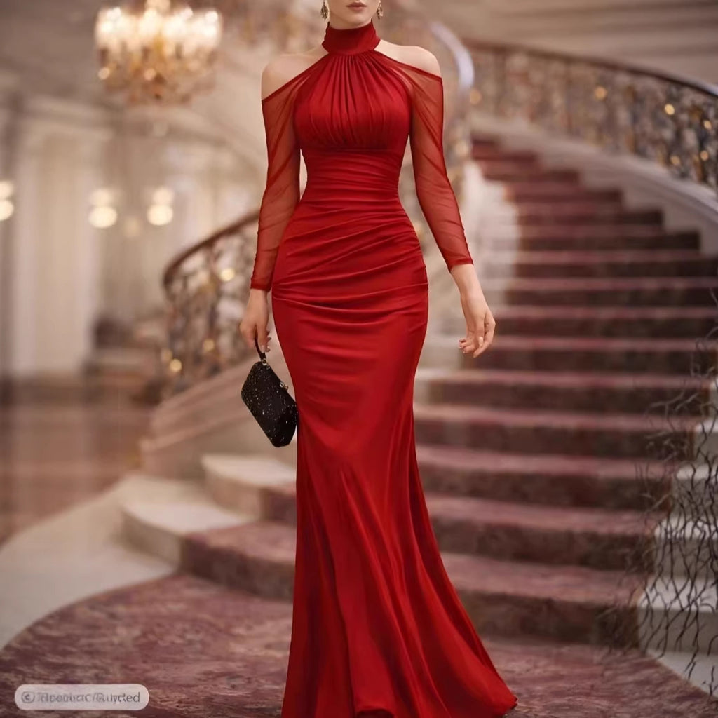 Sheer shoulder length long sleeved evening gown