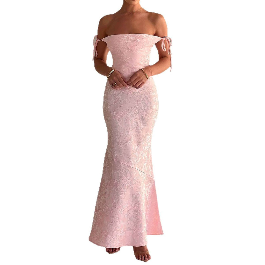 Elegant evening gown with hip hugging suspender dress