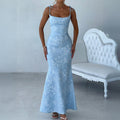 Elegant evening gown with hip hugging suspender dress