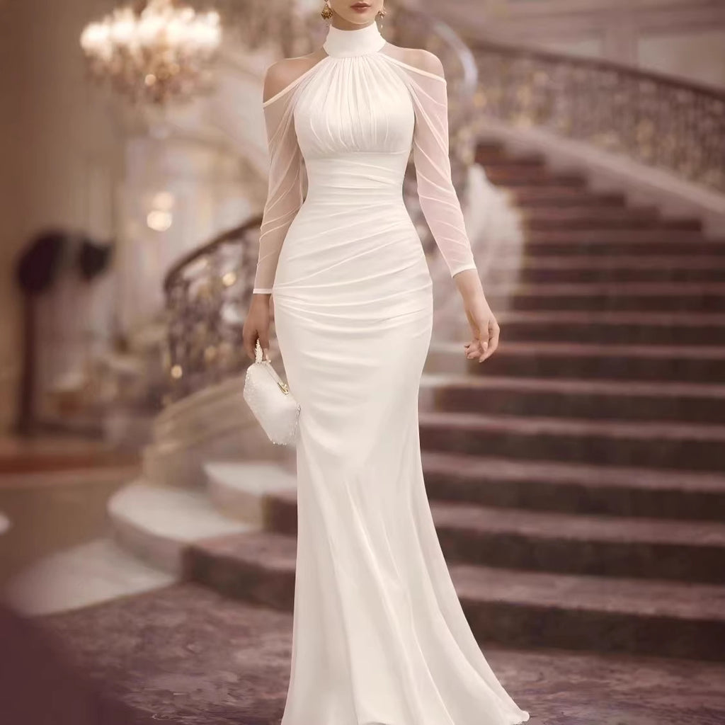 Sheer shoulder length long sleeved evening gown