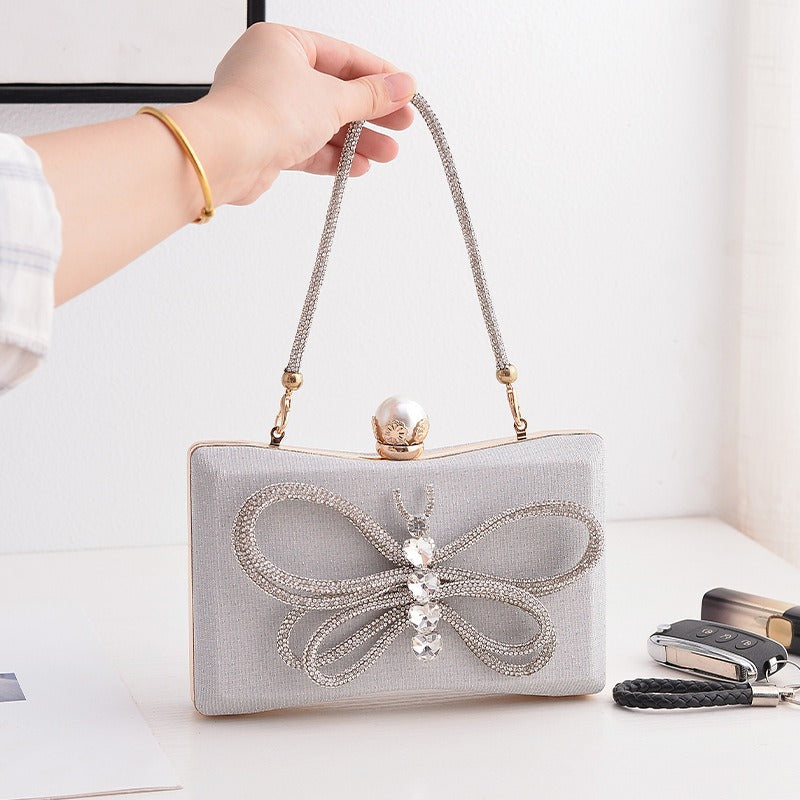 Cross border Hot Style Banquet Bag Versatile Temperament Dress Bowtie Evening Bag Handheld Oblique Straddle Bag Female